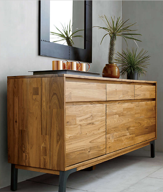 Lakin 71-inch teak credenza styled beneath a mirror with potted plants